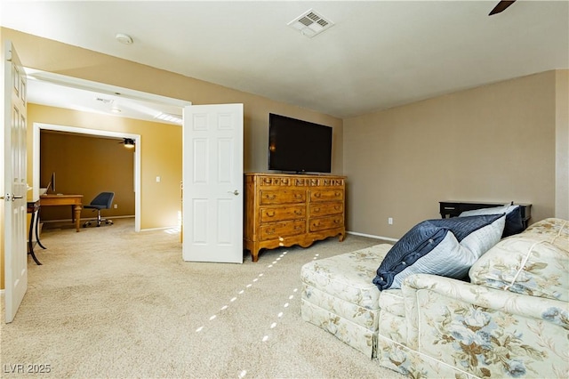 bedroom featuring ceiling fan and light colored carpet