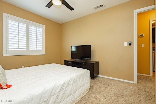 bedroom featuring ceiling fan and light colored carpet