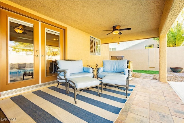 view of patio / terrace featuring ceiling fan