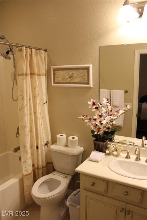 full bathroom featuring toilet, vanity, and shower / tub combo with curtain