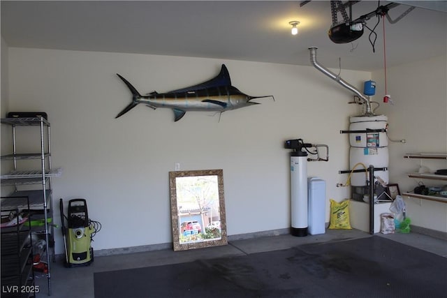 garage featuring a garage door opener and water heater