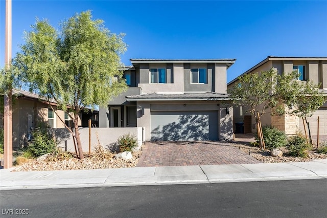 view of front of property featuring a garage