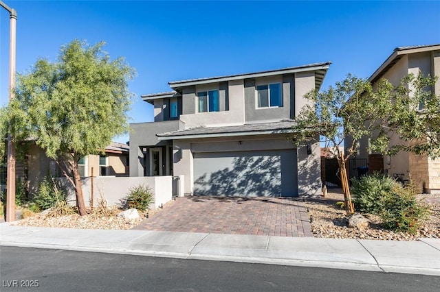 front of property featuring a garage