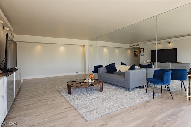 living room featuring light wood-type flooring