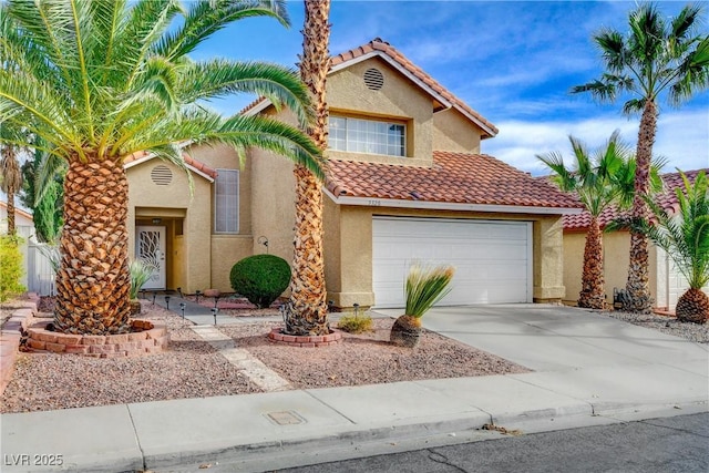 3320 Haven Beach Way, Las Vegas, NV 89117 - view of front of property with stucco siding, driveway, a tiled roof, and an attached garage