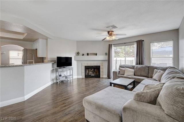 3320 Haven Beach Way, Las Vegas, NV 89117 - living area with dark wood-style flooring, baseboards, and a ceiling fan