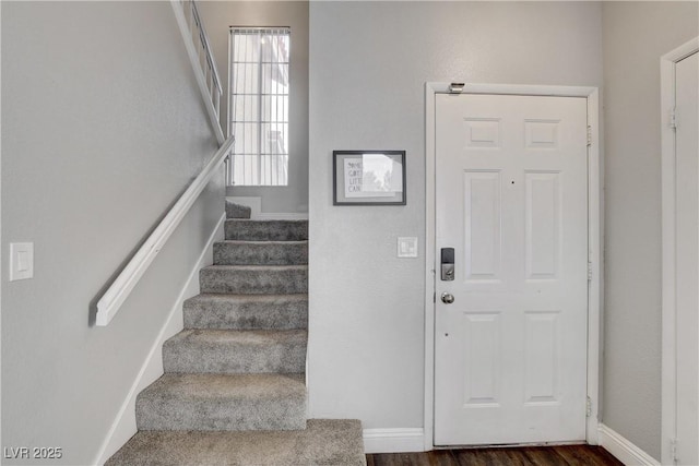 3320 Haven Beach Way, Las Vegas, NV 89117 - entryway featuring stairs, dark wood finished floors, and baseboards