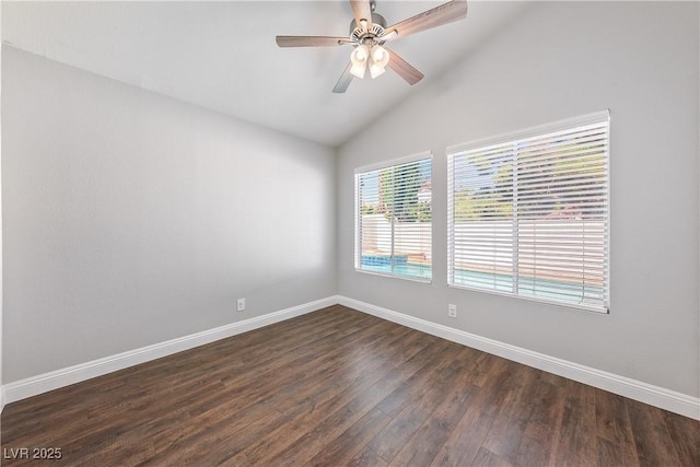 3320 Haven Beach Way, Las Vegas, NV 89117 - spare room with dark wood finished floors, vaulted ceiling, and a ceiling fan