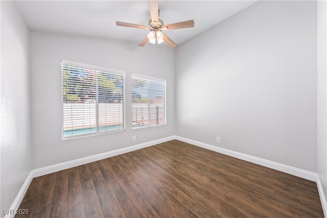 3320 Haven Beach Way, Las Vegas, NV 89117 - empty room featuring dark wood-style flooring, ceiling fan, and vaulted ceiling