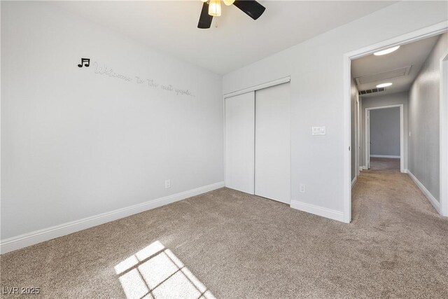 3320 Haven Beach Way, Las Vegas, NV 89117 - unfurnished bedroom featuring carpet, a closet, ceiling fan, and attic access