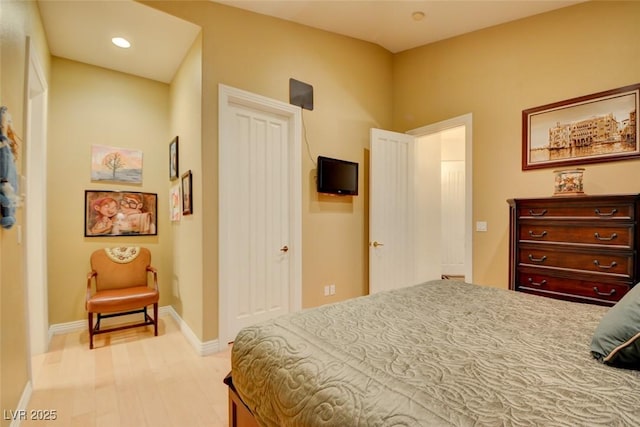 bedroom with light wood-type flooring