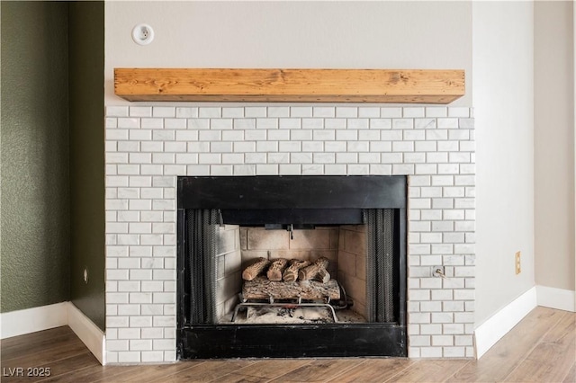 interior details with hardwood / wood-style flooring