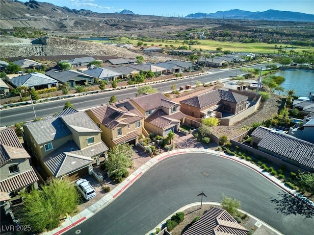 birds eye view of property featuring a mountain view