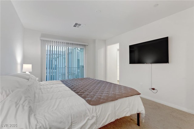 bedroom featuring carpet