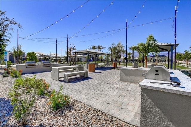 view of patio with a gazebo and exterior kitchen