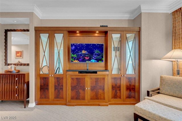 living room with ornamental molding