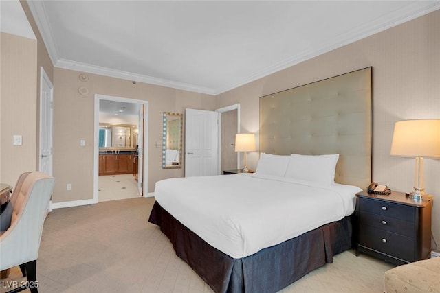 bedroom with ensuite bathroom and ornamental molding