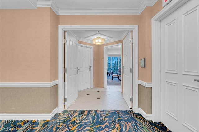 hallway with crown molding and light tile patterned flooring