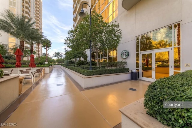 view of home's community featuring a patio