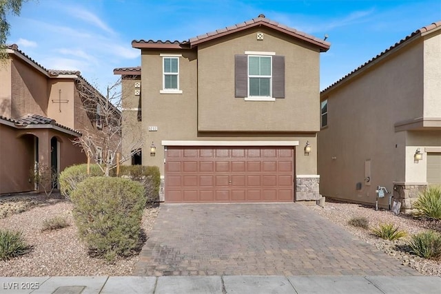 view of front of home with a garage