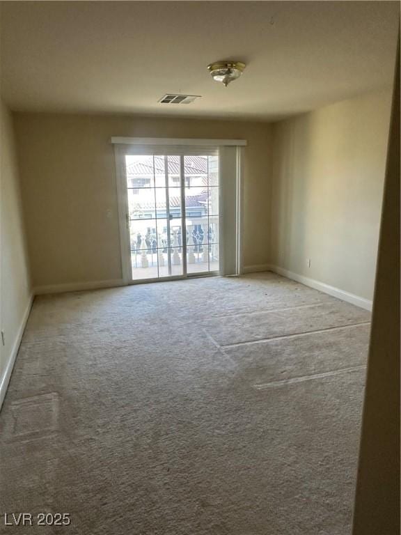 spare room with carpet