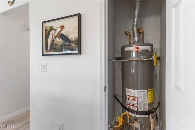 utility room with secured water heater