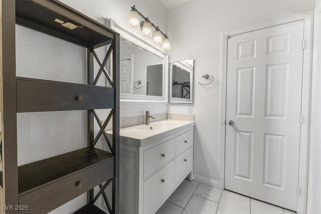 bathroom with vanity and tile patterned floors