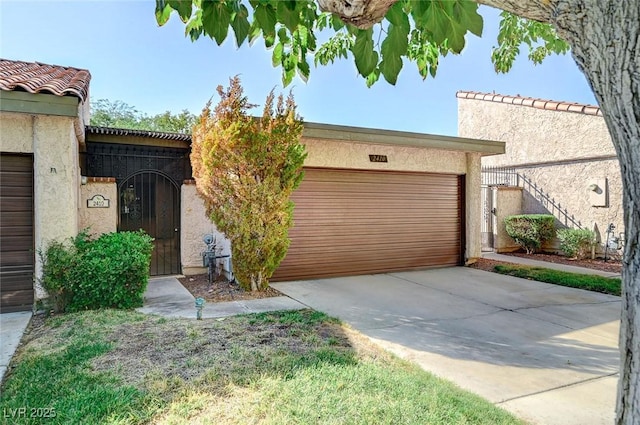 view of front of home with a garage