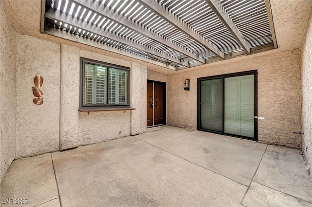 view of patio / terrace featuring a pergola