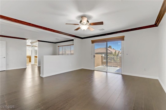 spare room featuring ceiling fan, crown molding, and dark hardwood / wood-style floors