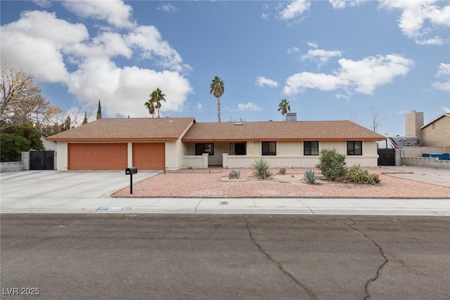 single story home featuring a garage