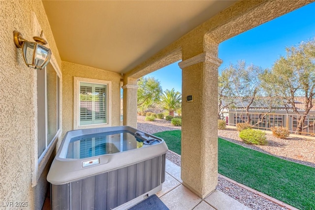 view of patio featuring a hot tub