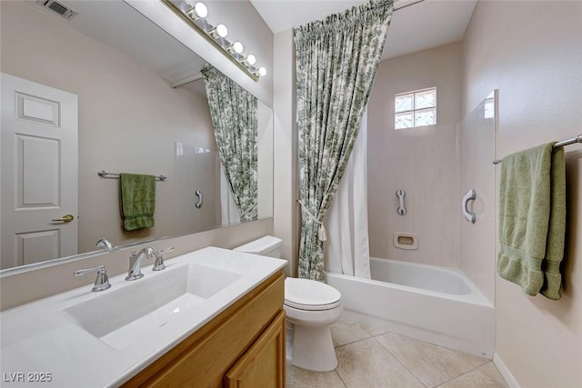 full bathroom with tile patterned flooring, vanity, shower / bath combo, and toilet