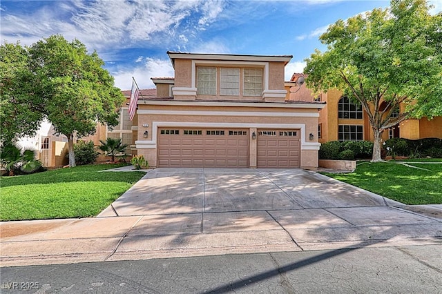 view of front facade featuring a garage and a front yard