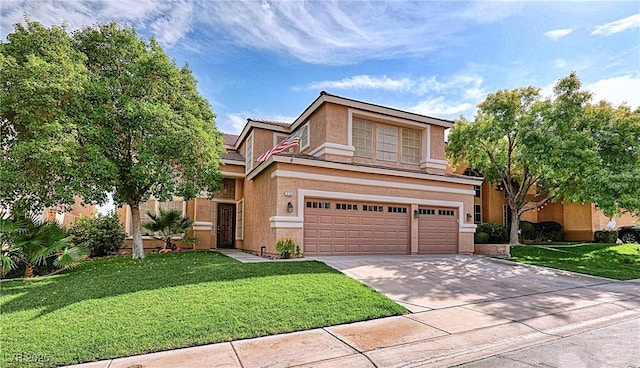 view of front of house featuring a front yard and a garage