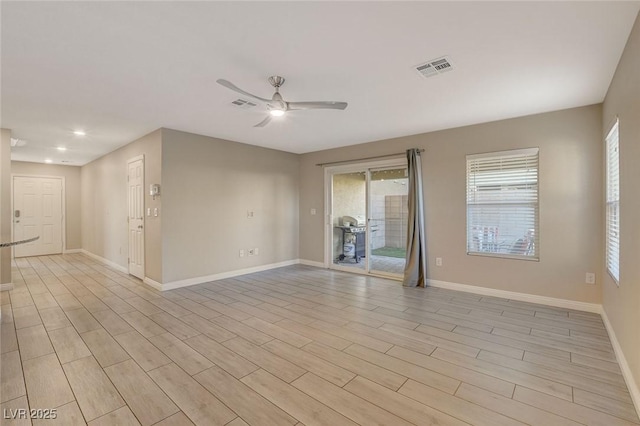 empty room featuring ceiling fan