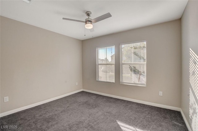 carpeted empty room with ceiling fan