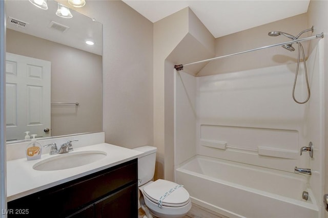 full bathroom featuring bathtub / shower combination, vanity, and toilet