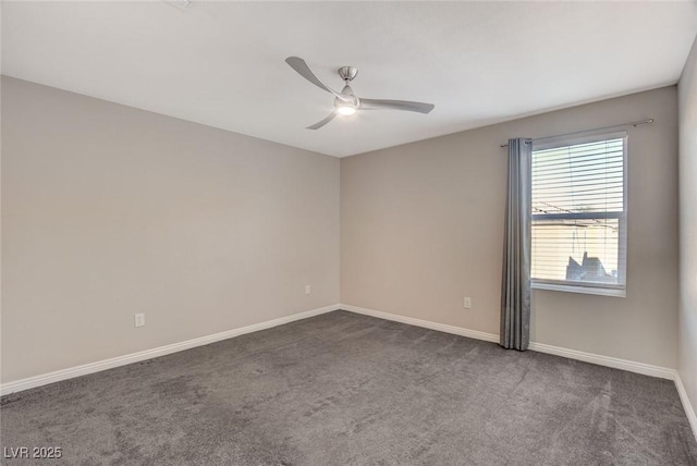 unfurnished room featuring dark carpet and ceiling fan