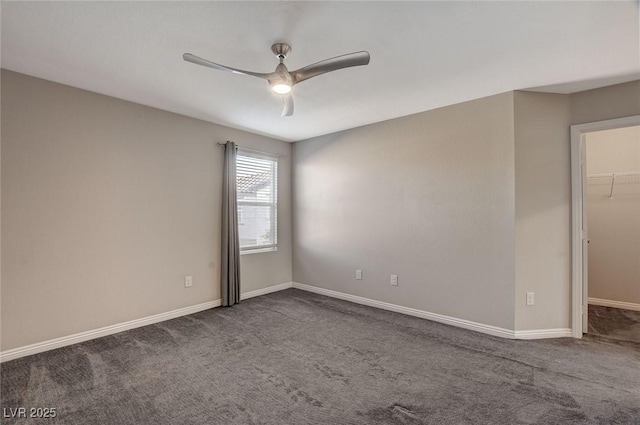 spare room featuring carpet flooring and ceiling fan