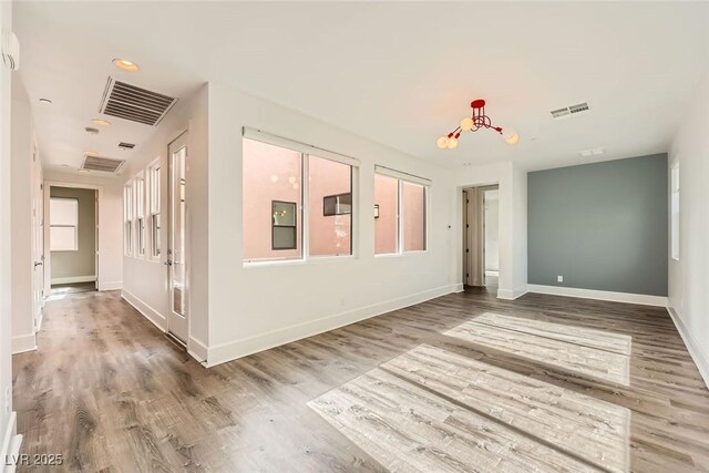 interior space with hardwood / wood-style flooring