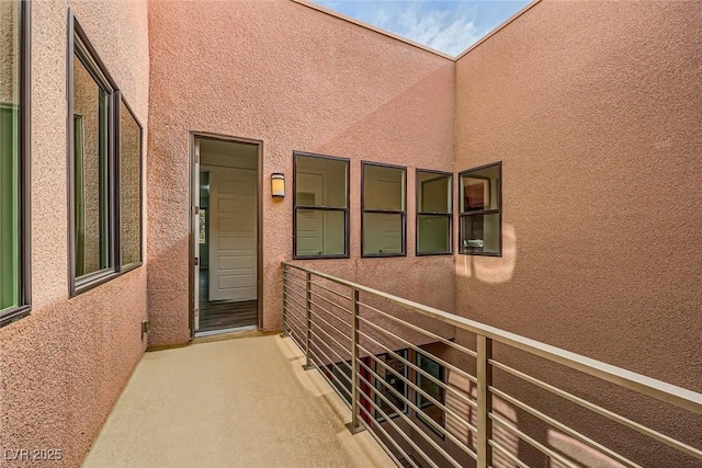 entrance to property featuring a balcony