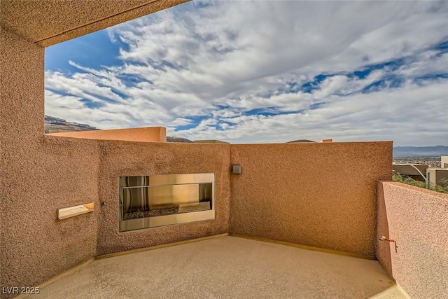 view of patio / terrace featuring a balcony