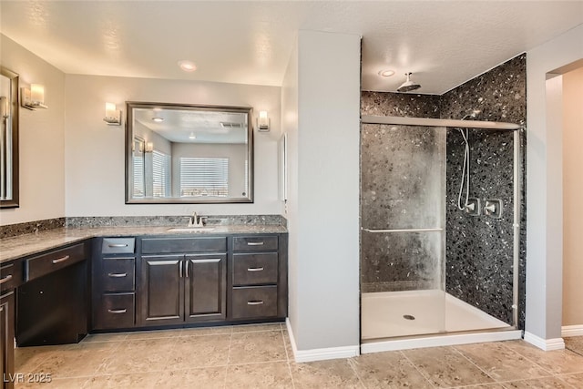 bathroom featuring vanity and walk in shower