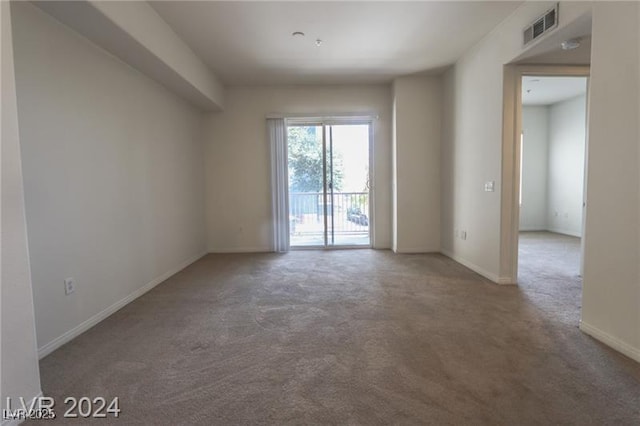 empty room featuring carpet floors