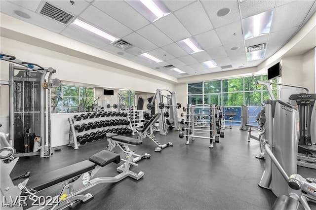 workout area with a drop ceiling