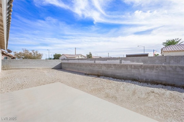 view of yard with a patio area