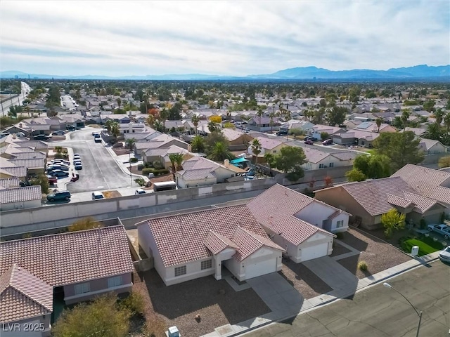 drone / aerial view featuring a mountain view