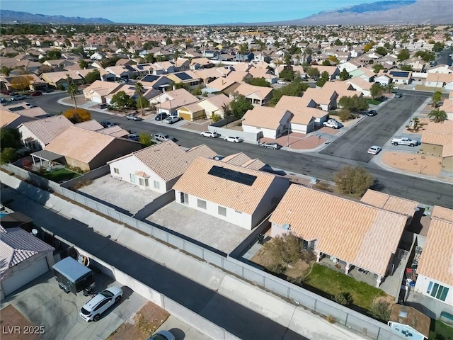 drone / aerial view featuring a mountain view