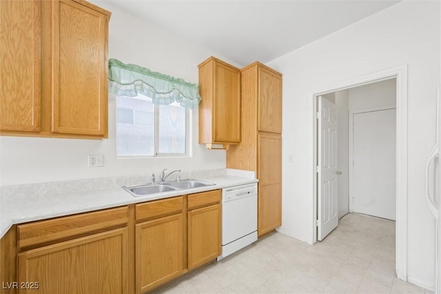 kitchen with white dishwasher and sink